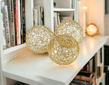 Set of Three Gold Aluminum Decorative Orbs