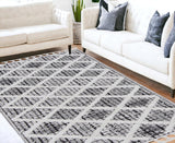 5' X 8' Charcoal Geometric Diamond Indoor Area Rug With Fringe