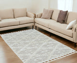 5' X 8' Ivory Or Beige Geometric Diamond Indoor Area Rug With Fringe