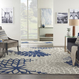 7' X 10' Ivory And Blue Floral Indoor Outdoor Area Rug