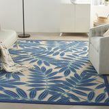 7' X 10' Blue And Ivory Floral Stain Resistant Indoor Outdoor Area Rug