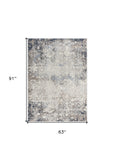 5’ X 8’ Navy And Beige Distressed Vines Area Rug