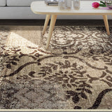 5' X 8' Tan And Brown Damask Distressed Stain Resistant Area Rug