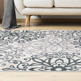 5' X 8' Oatmeal And Gray Medallion Power Loom Stain Resistant Area Rug