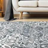 5' X 8' Oatmeal And Gray Medallion Power Loom Stain Resistant Area Rug