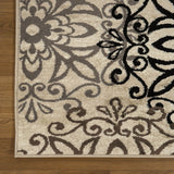 7' X 9' Tan Gray And Black Floral Medallion Stain Resistant Area Rug