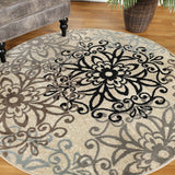 7' X 9' Tan Gray And Black Floral Medallion Stain Resistant Area Rug