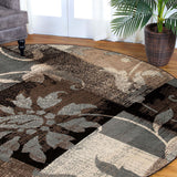 7' X 9' Beige And Gray Floral Power Loom Distressed Stain Resistant Area Rug