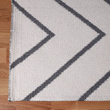 5' X 7' Ivory Waves Stain Resistant Indoor Outdoor Area Rug