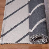 5' X 7' Ivory Waves Stain Resistant Indoor Outdoor Area Rug