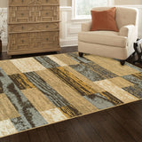 5' X 8' Light Blue And Beige Patchwork Power Loom Stain Resistant Area Rug