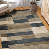 7' X 9' Light Blue And Ivory Patchwork Power Loom Stain Resistant Area Rug