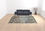 10' X 13' Brown Light Blue And Gray Distressed Diamond Area Rug