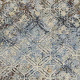 10' X 13' Brown Light Blue And Gray Distressed Diamond Area Rug