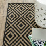 2' X 8' Black and Tan Geometric Stain Resistant Indoor Outdoor Area Rug