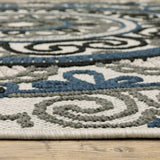 10' x 13' Blue and Beige Geometric Stain Resistant Indoor Outdoor Area Rug