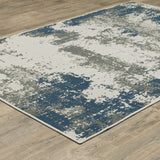 10' x 13' Blue and Beige Abstract Stain Resistant Indoor Outdoor Area Rug