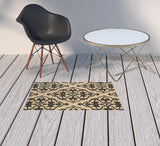 2' x 3' Beige and Black Oriental Stain Resistant Indoor Outdoor Area Rug