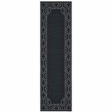 2' X 8' Black and Ivory Stain Resistant Indoor Outdoor Area Rug