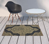 2' X 4' Black and Tan Oriental Stain Resistant Indoor Outdoor Area Rug