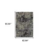 5' x 8' Black Silver and Gray Abstract Shag Power Loom Area Rug