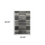 5' x 8' Black and Gray Geometric Shag Power Loom Area Rug
