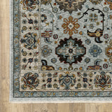 10' X 13' Blue Beige Grey Green Yellow And Rust Oriental Power Loom Stain Resistant Area Rug With Fringe