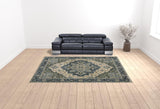 10' X 13' Blue Grey Beige Tan Green And Gold Oriental Power Loom Stain Resistant Area Rug With Fringe