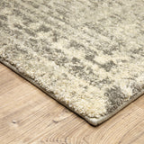 8' X 11' Grey Ivory Beige And Taupe Abstract Power Loom Stain Resistant Area Rug