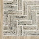 8' X 11' Ivory Beige Grey Brown Pale Blue And Charcoal Geometric Power Loom Stain Resistant Area Rug