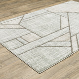 8' X 11' Grey Charcoal Ivory Tan Brown And Beige Geometric Power Loom Stain Resistant Area Rug