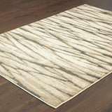 2' X 3' Ivory Sand And Ash Abstract Power Loom Stain Resistant Area Rug