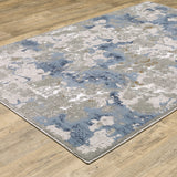 10' X 13' Grey Blue Ivory Navy Beige And Brown Abstract Power Loom Stain Resistant Area Rug