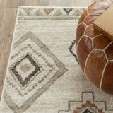 4' X 6' Black Grey Tan Orange And Ivory Southwestern Power Loom Stain Resistant Area Rug