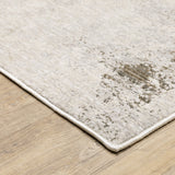 6' X 9' Beige And Ivory Abstract Power Loom Stain Resistant Area Rug