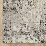 6' X 9' Grey Ivory Beige Charcoal Black Tan And Brown Abstract Power Loom Stain Resistant Area Rug