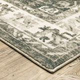 8' X 10' Grey Ivory And Blue Oriental Power Loom Stain Resistant Area Rug