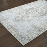 5' X 8' Grey And Gold Oriental Power Loom Stain Resistant Area Rug