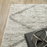6' X 9' Grey And Ivory Abstract Shag Power Loom Stain Resistant Area Rug