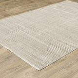 6' x 9' Beige and Ivory Geometric Power Loom Area Rug