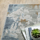 8' X 11' Grey Blue Ivory Navy Beige And Brown Abstract Power Loom Stain Resistant Area Rug