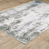 5' X 7' Gray And Ivory Abstract Printed Stain Resistant Non Skid Area Rug