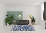 7' X 10' Blue Taupe And Ivory Ikat Distressed Area Rug