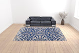 10' X 14' Blue Taupe And Ivory Ikat Distressed Area Rug