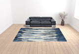 10' X 14' Ivory Blue And Gray Abstract Distressed Area Rug