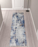 10' Ivory and Blue Abstract Power Loom Distressed Runner Rug