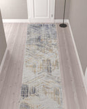 12' Tan Ivory And Gray Abstract Power Loom Distressed Runner Rug