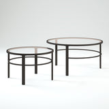 Set of Two 36" Clear And Black Glass And Steel Round Nested Coffee Tables