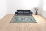 9' x 12' Light Blue Floral Power Loom Area Rug