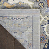 5' x 7' Green and Ivory Floral Power Loom Area Rug